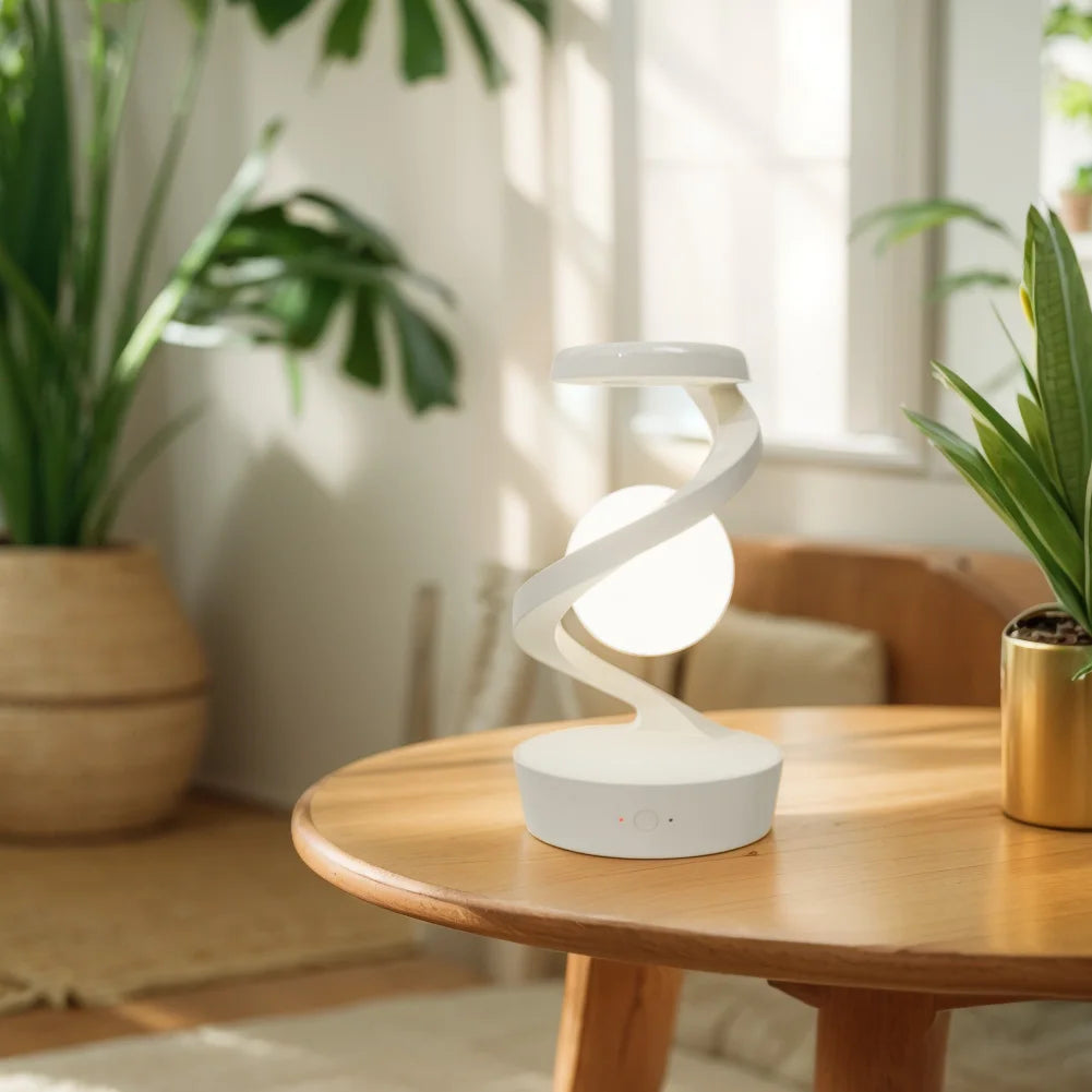 Levitating LED Moon Lamp with Wireless Charger floating above wooden base.